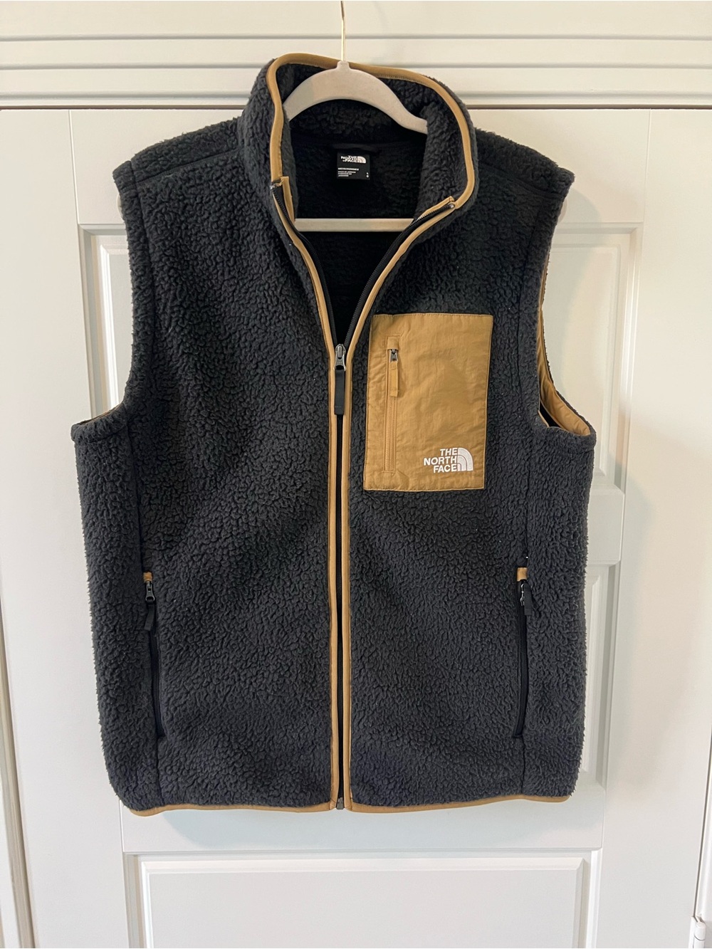 The North Face Black Sherpa Fleece Vest with Tan Pocket